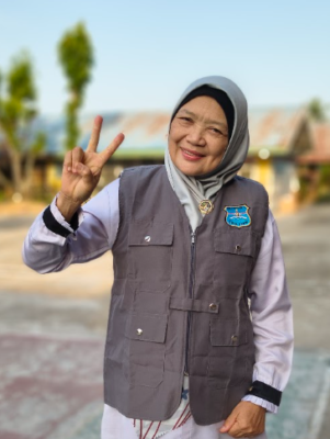 Dra. Ellya, M.Pd